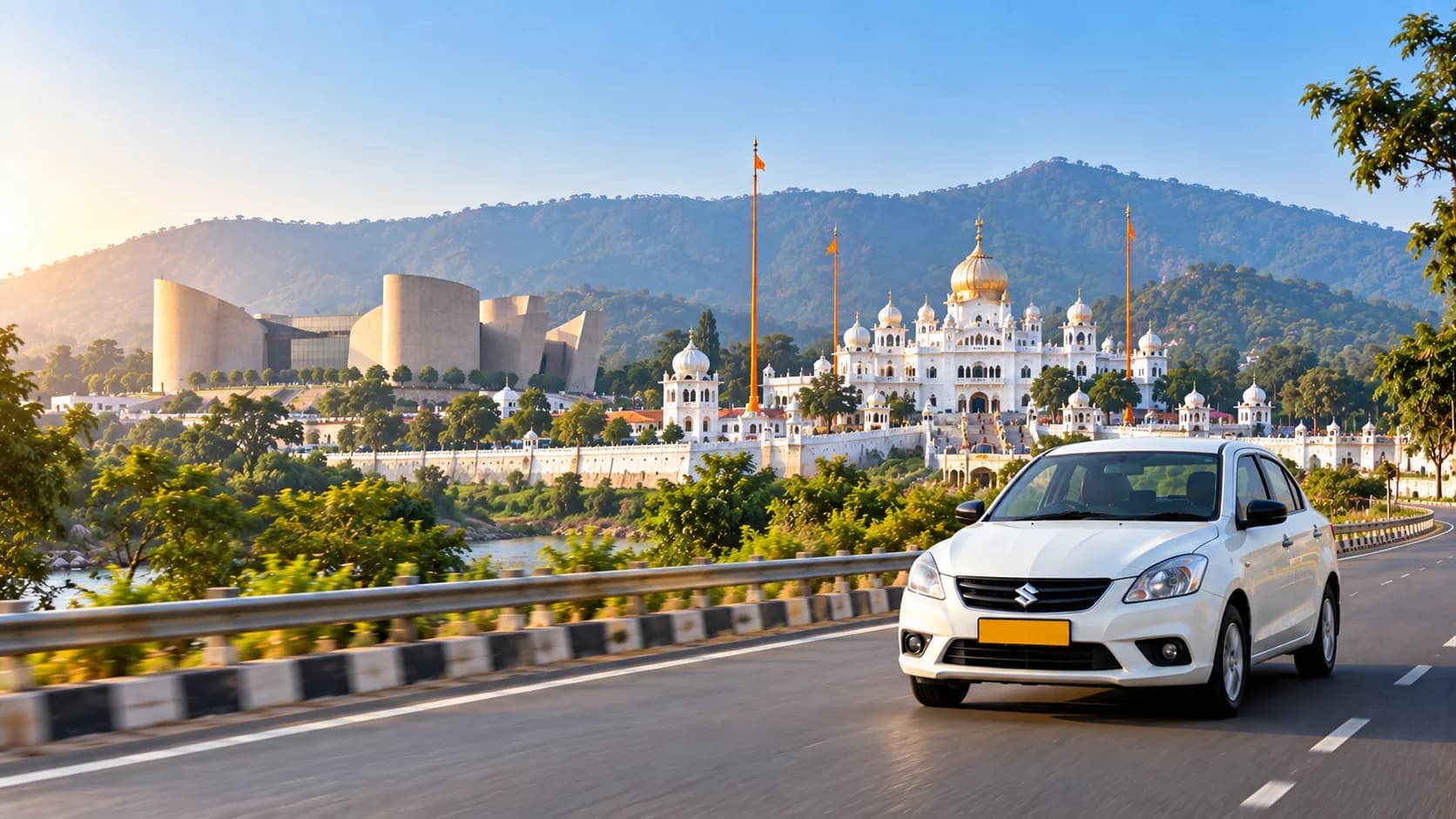 A white sedan taxi on a riverside road below a white gurdwara with a golden dome and a sandstone museum complex, with wooded hills behind
